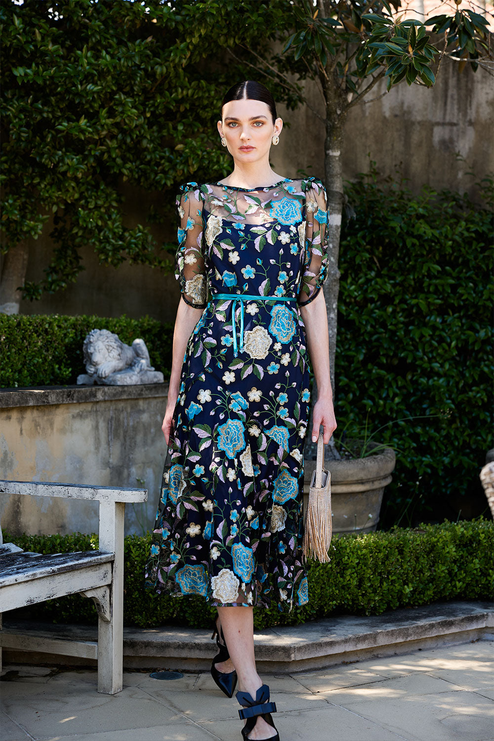 Lanaberg model in green jacquard midi dress with puff sleeves — Melbourne fashion clothing store