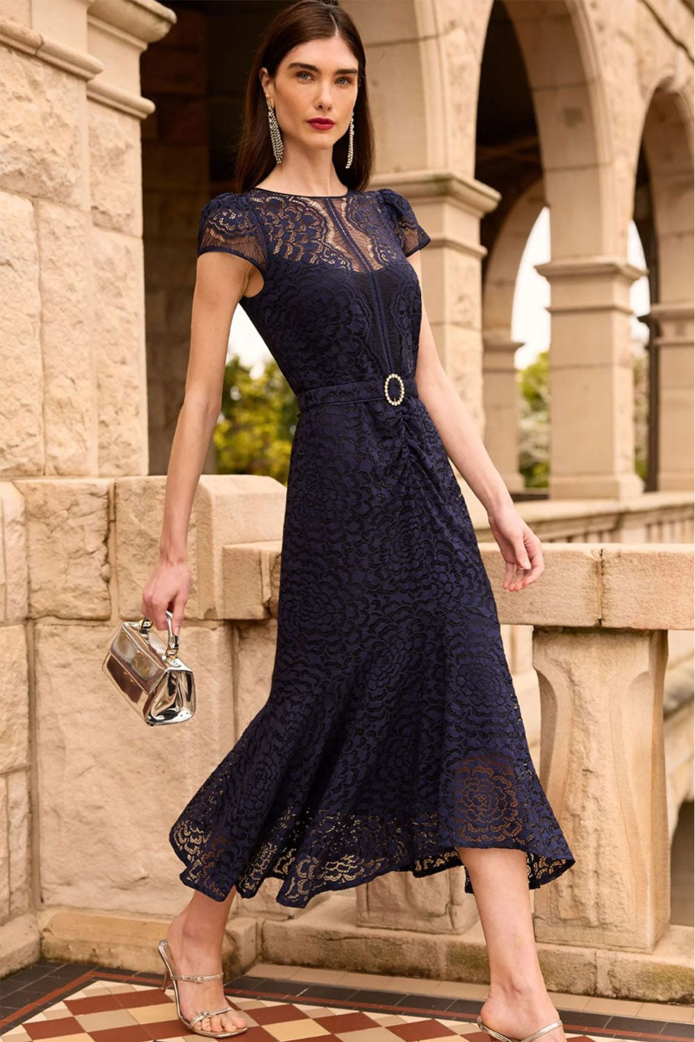 Lanaberg model in green jacquard midi dress with puff sleeves — Melbourne fashion clothing store