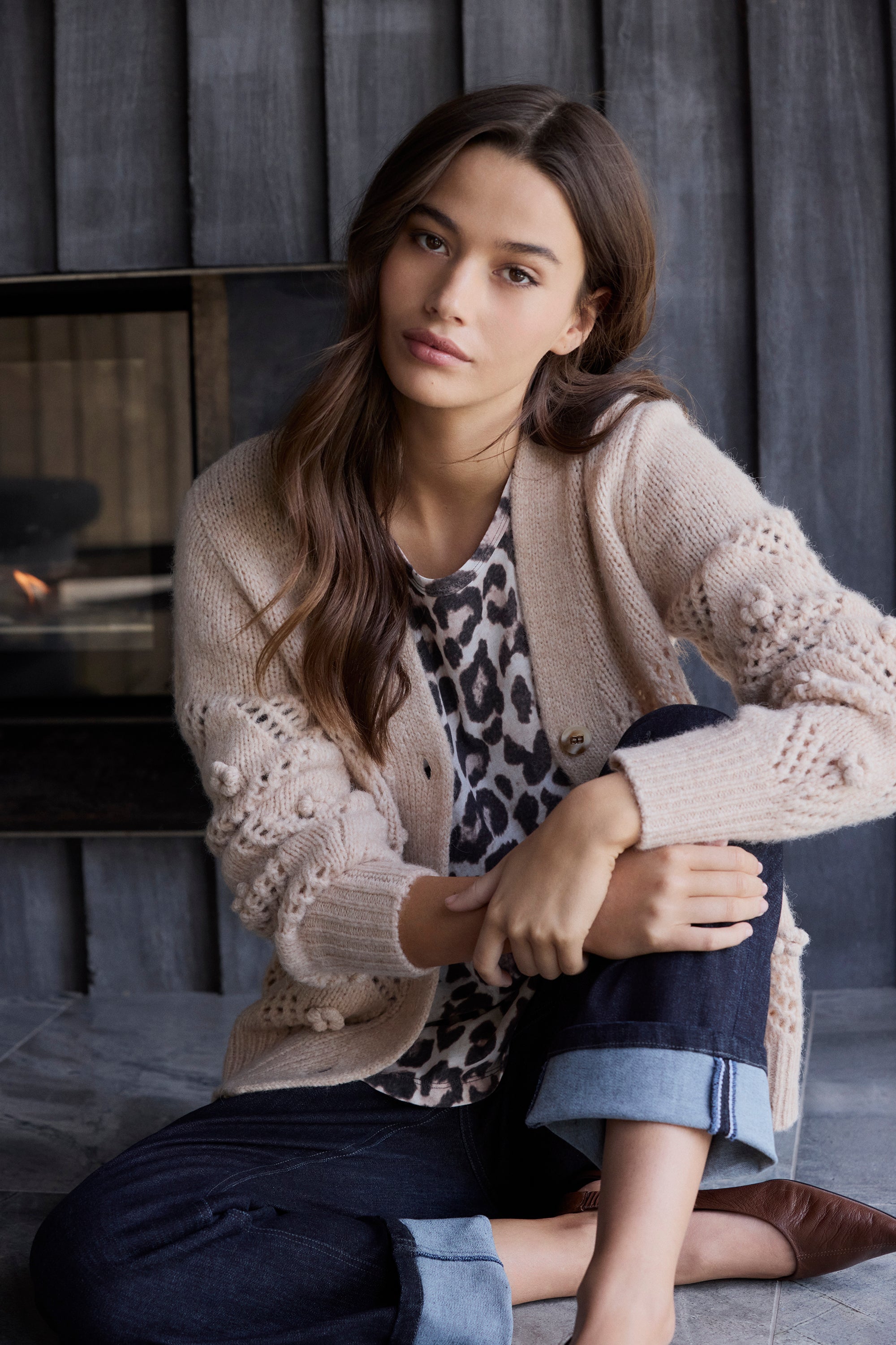 Lanaberg model in floral boho dress with boots walking along black sand beach — Melbourne Australia fashion store