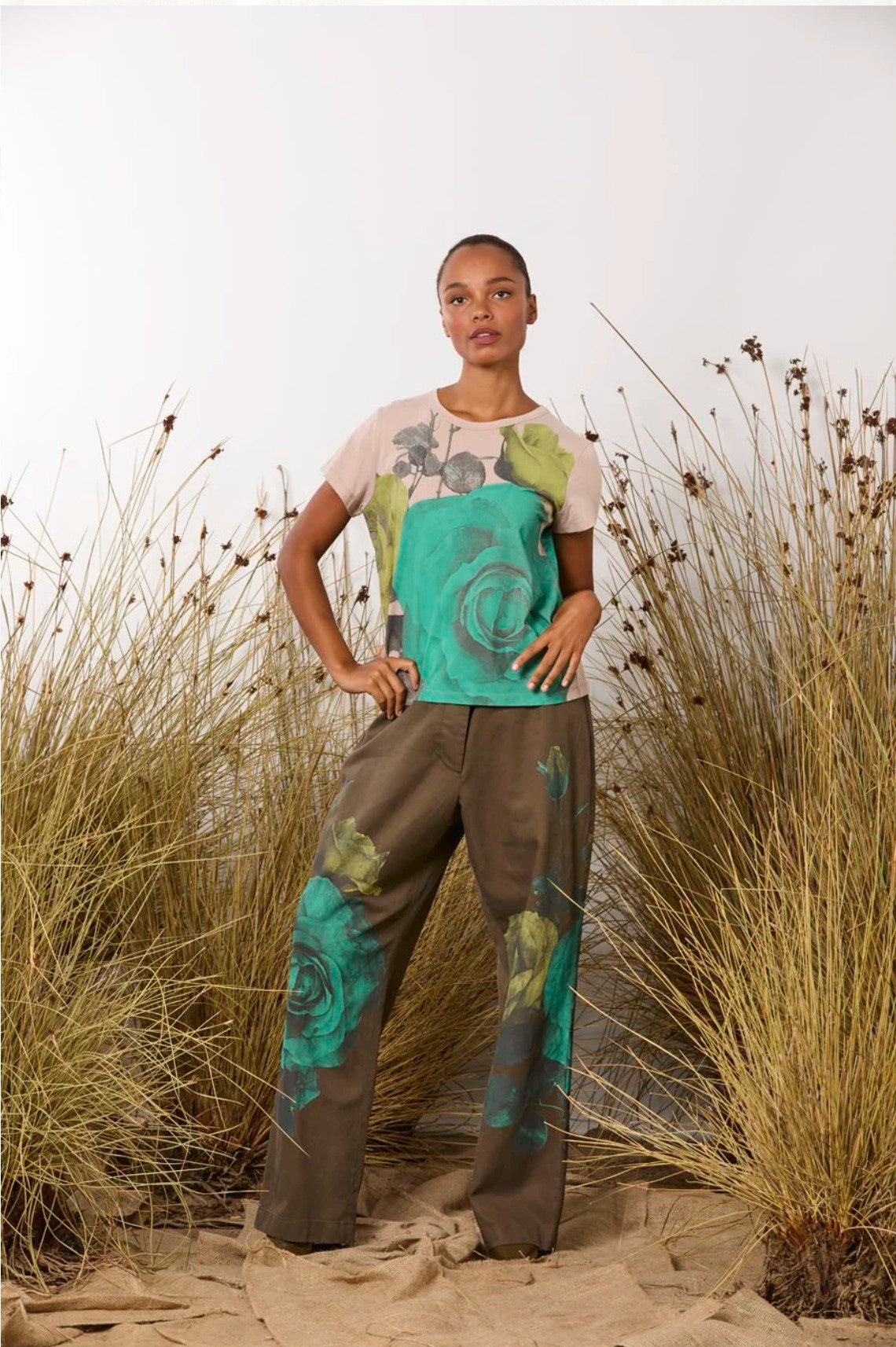 Lanaberg model in opulent floral jacquard suit and cape with black silk blouse — Melbourne fashion clothing store