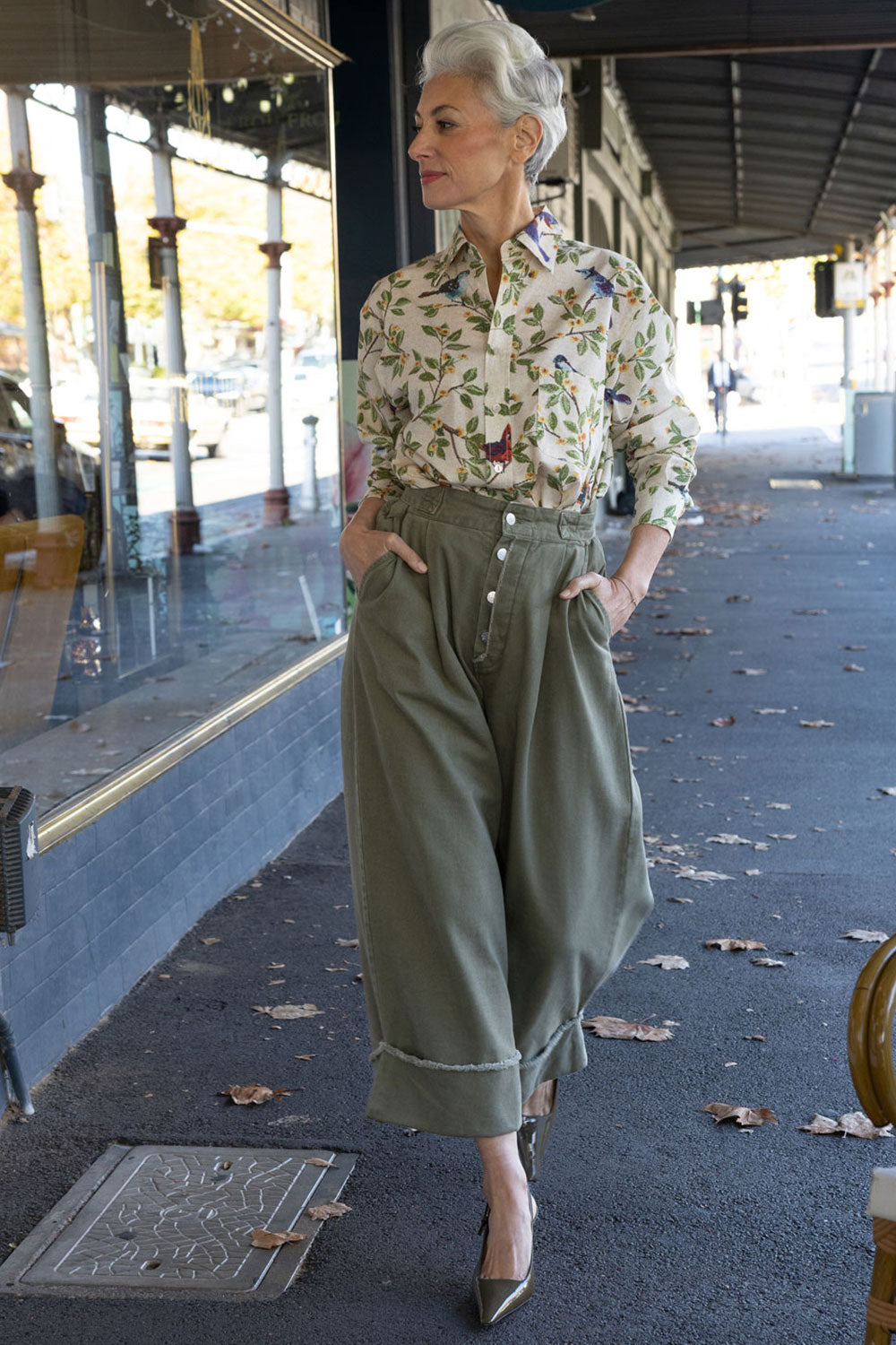 Lanaberg model in opulent floral jacquard suit and cape with black silk blouse — Melbourne fashion clothing store